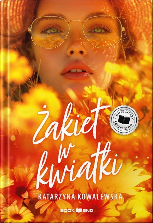 Żakiet w kwiatki. Duże Litery